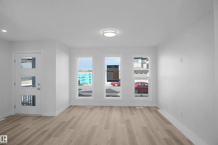 Property Photo:  7393 Keeler Crescent SW  AB T6W 4J9 
