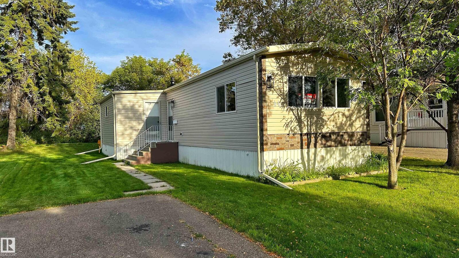 Property Photo: 44 Rim Road NW AB T6P 1G7