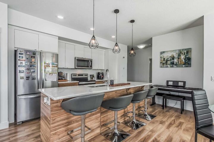 Property Photo:  19621 40 Street SE 112  AB T3M 3B2 