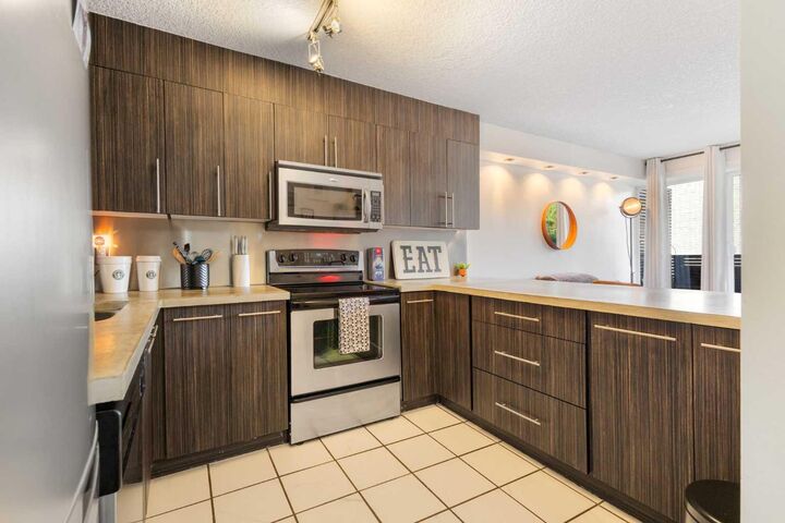 Property Photo:  1904 10 Street SW 406  AB T2T 3G1 