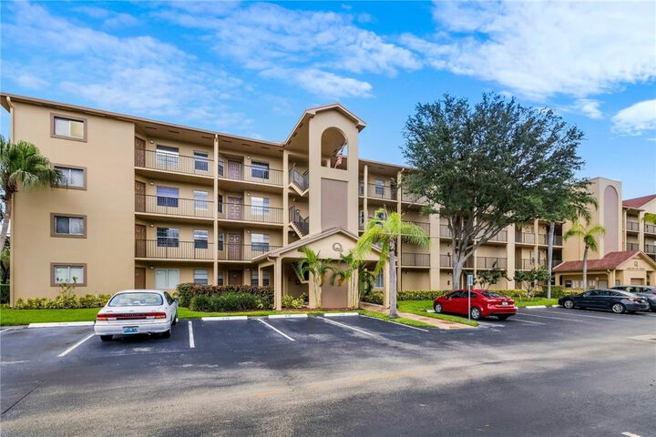 Property Photo:  1400 SW 124th Terrace 105Q  FL 33027 