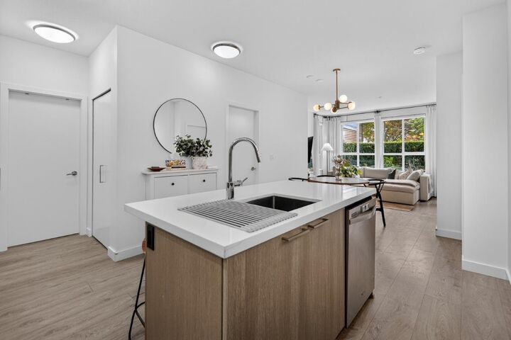 Property Photo: 611 Regan Avenue 103 BC V3J 3A3