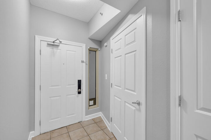 Property Photo:  9900 S Thomas Drive Unit 1010  FL 32408 