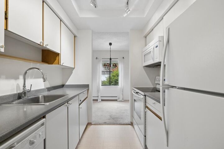 Property Photo: 1177 Howie Avenue 203 BC V3J 1T9