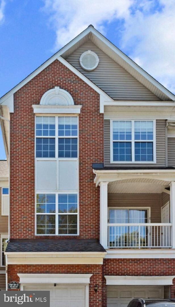 Property Photo:  14407 Hampshire Hall Court G-1004  MD 20772 