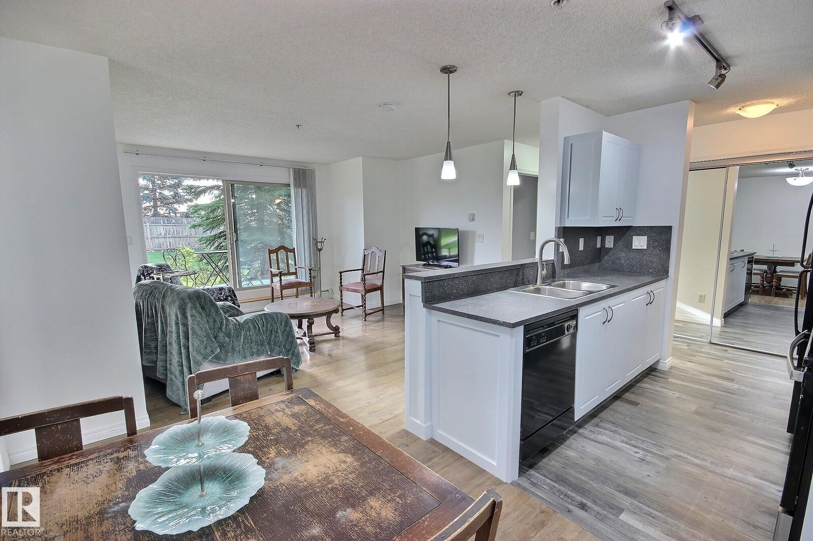 Property Photo: 13907 136 Street NW 105 AB T6V 1Y5