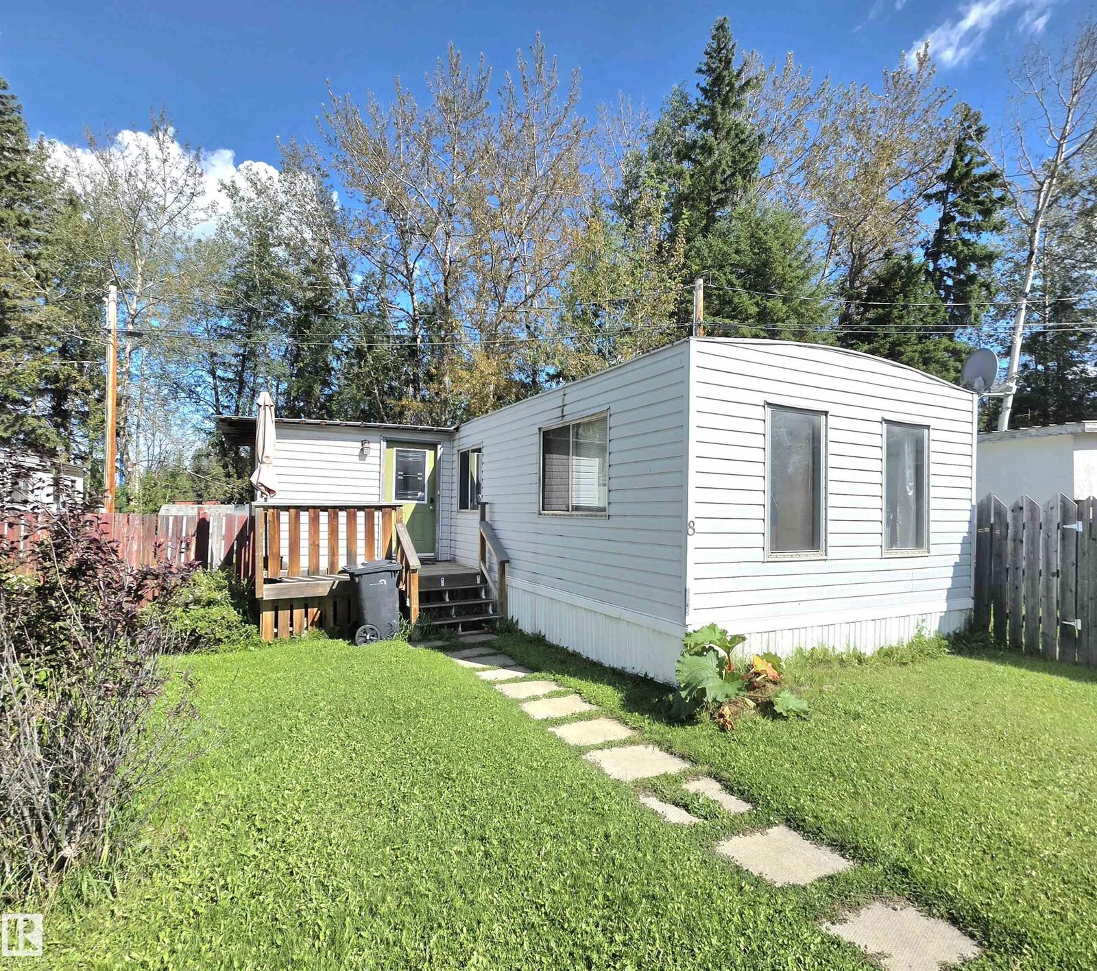 Property Photo:  #8 5002 56 Avenue  AB T7A 1M5 