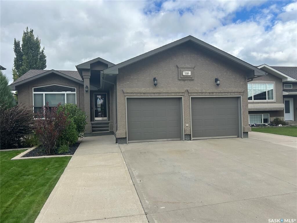 Property Photo:  310 Brooks Road  SK S4A 2X2 