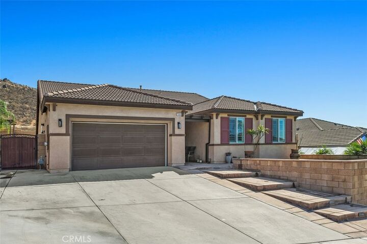 Property Photo:  7066 Almandine  CA 92509 