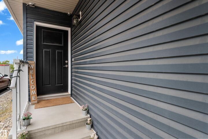 Property Photo:  603 Orchards Boulevard SW 4  AB T6X 2W8 