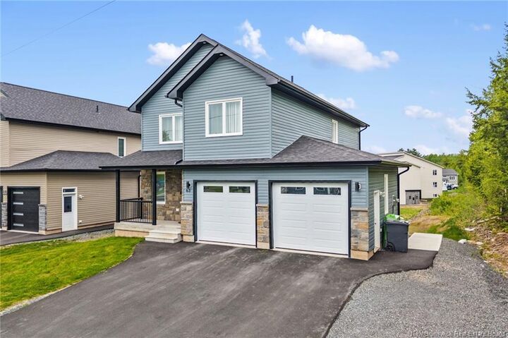 Property Photo:  63 Winterberry Drive  NB E3C 0M3 