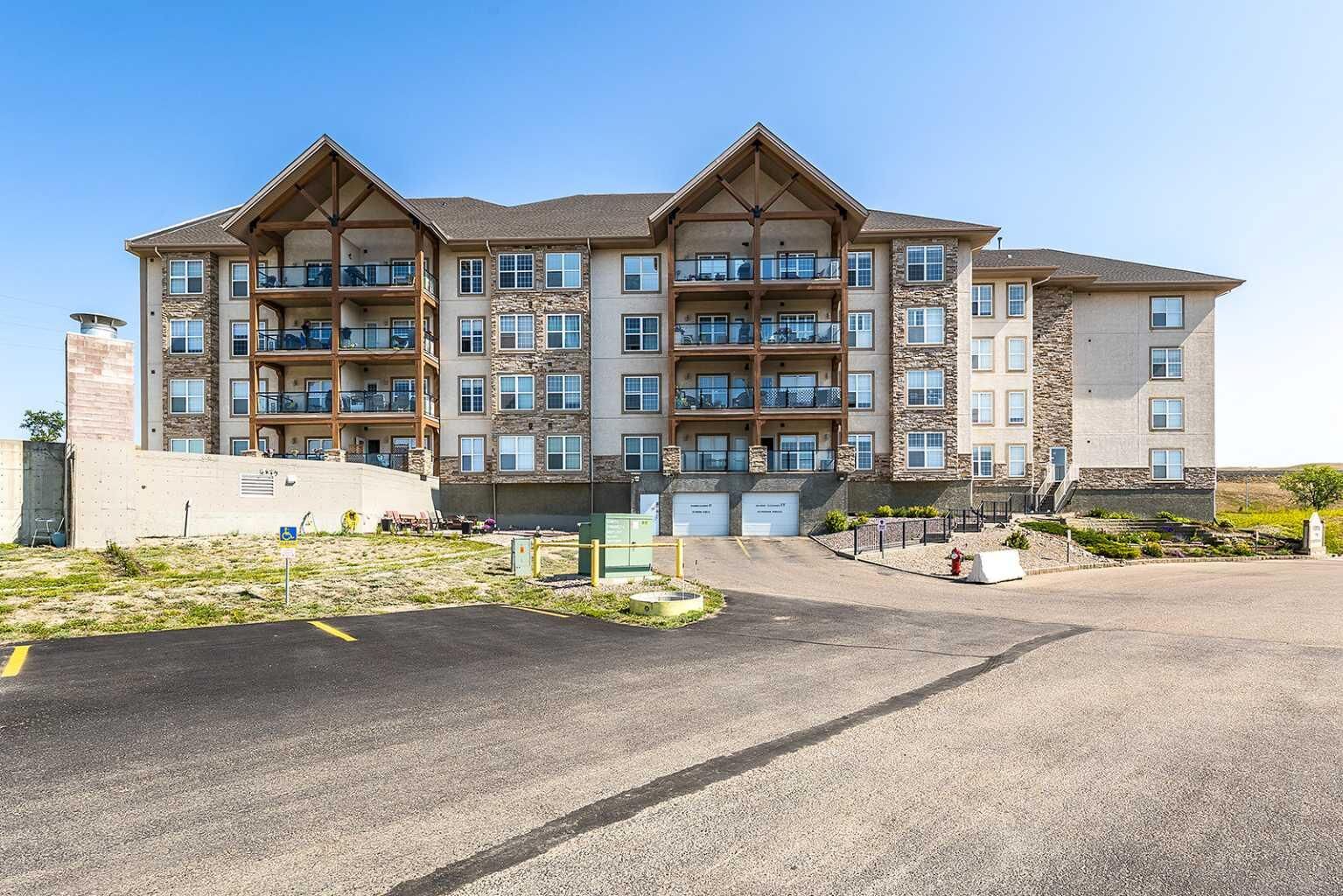 Property Photo:  201 River Ridge Drive NW 329  AB T1A 8V5 