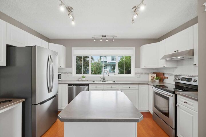 Property Photo: 54 Tuscany Valley Heights NW AB T3L 2E7