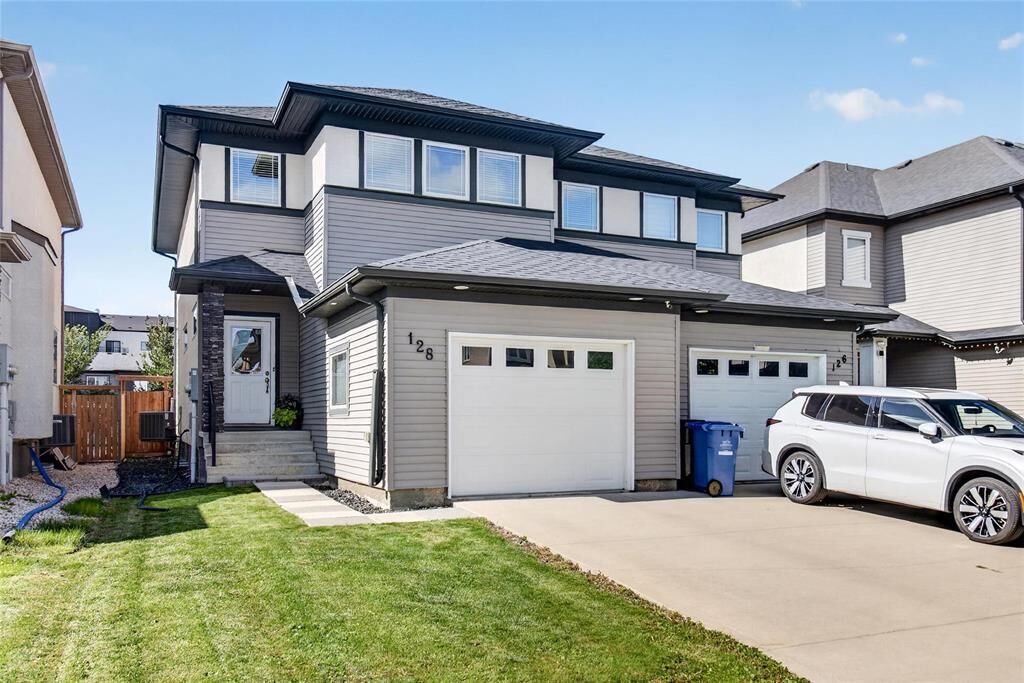 Property Photo: 128 Larry Vickar Drive MB R3W 0K4