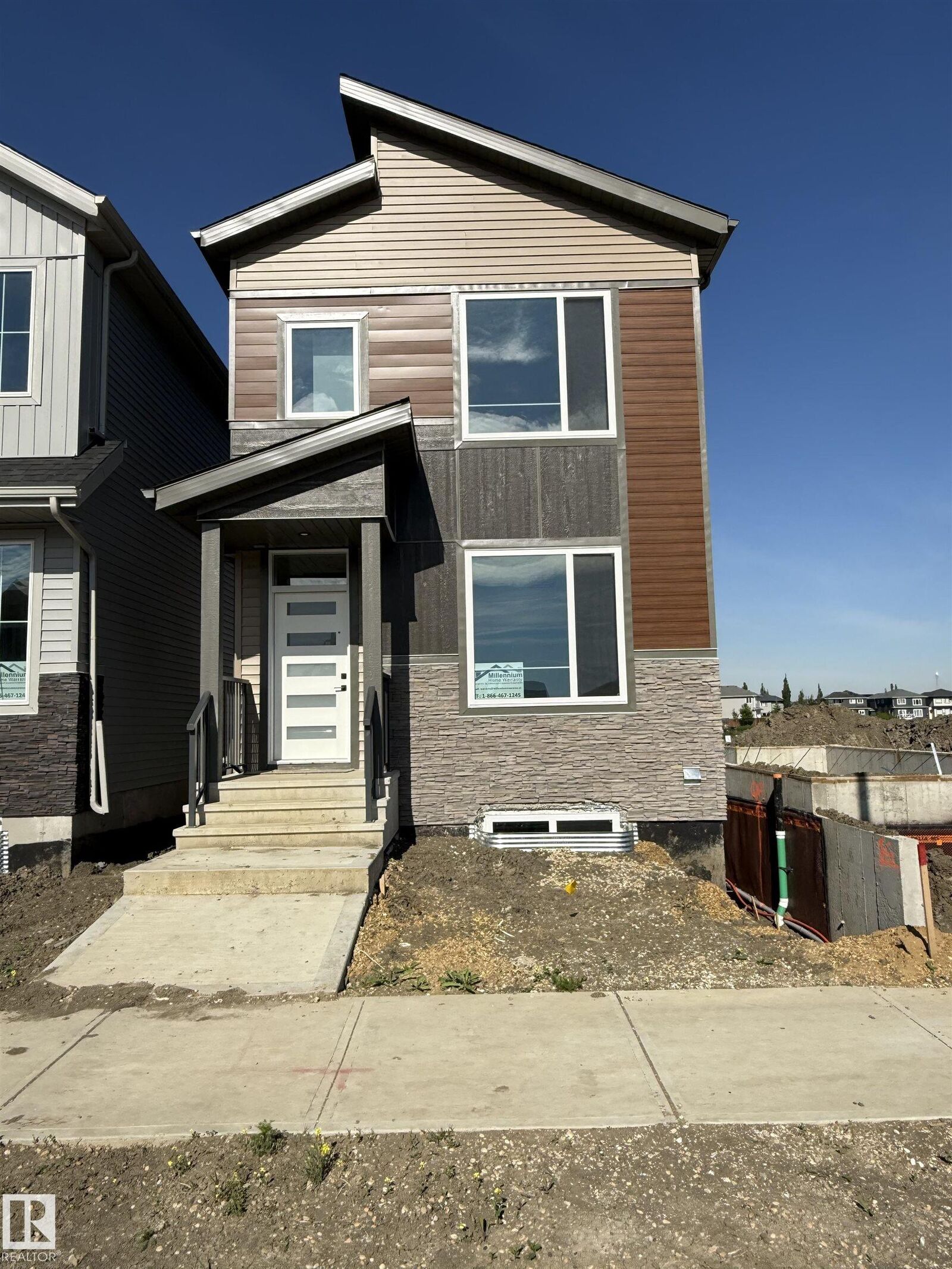 Property Photo:  102 Elliott Wynd  AB T8L 1R8 