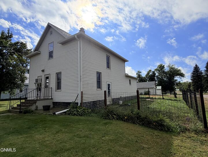 Property Photo: 223/227 Helen Street S ND 58483