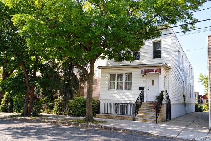 Property Photo:  6075 59th Avenue  NY 11378 