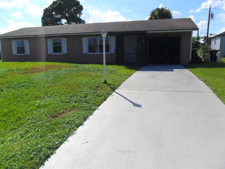 Property Photo:  2574 SW Deckard Street  FL 34953 