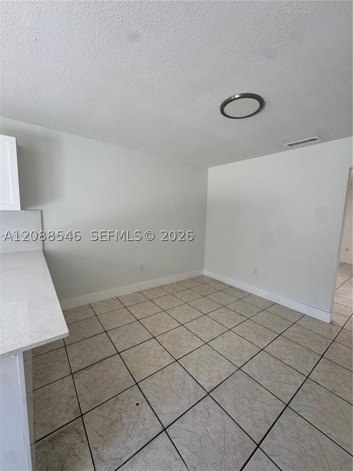 Property Photo:  1107 NW 30th Ave 1107  FL 33125 