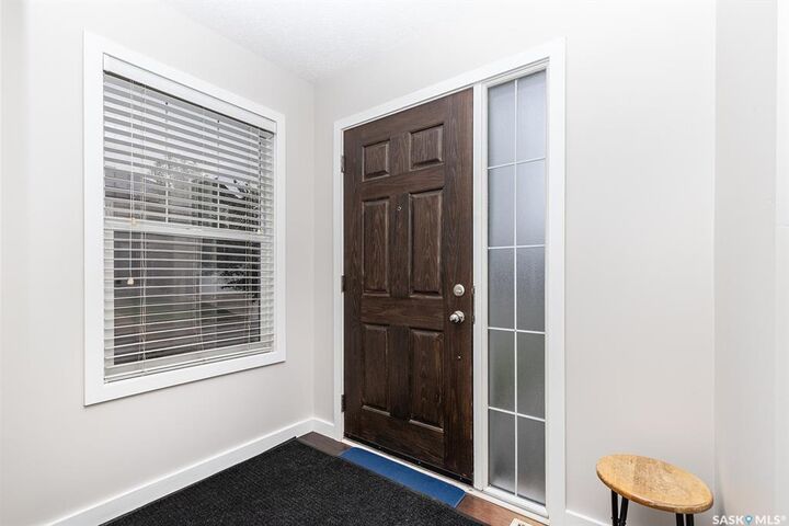 Property Photo:  410 Ledingham Way 211  SK S7V 0C4 