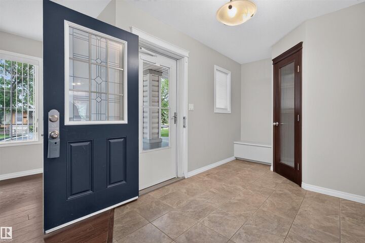 Property Photo:  11910 93 Street NW  AB T5G 1E5 