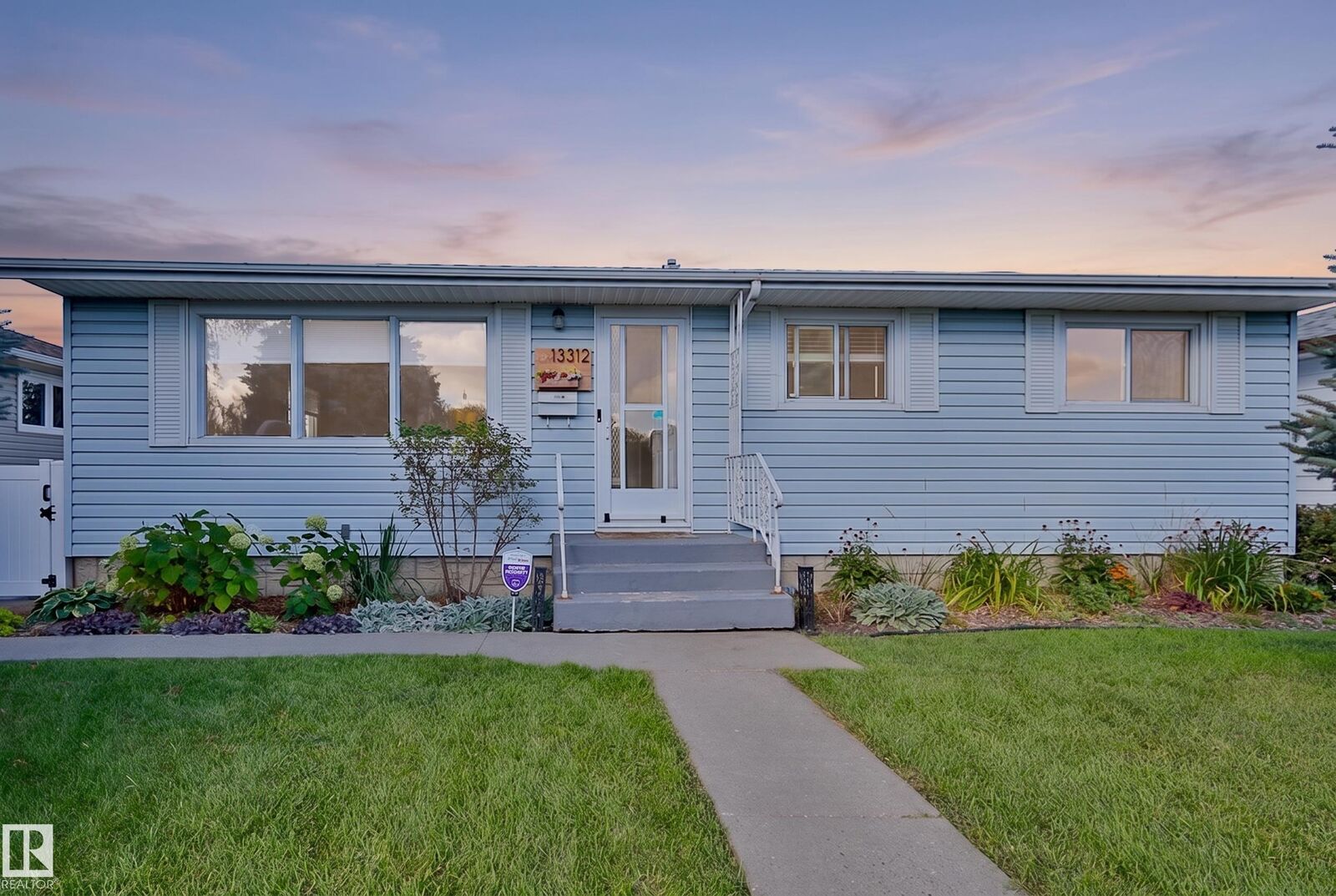 Property Photo:  13312 123A Street NW  AB T5L 0L6 