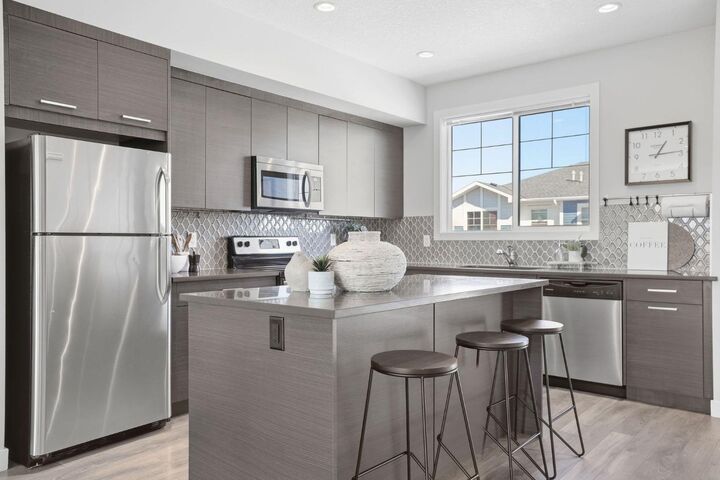 Property Photo:  1602 Jumping Pound Common  AB T4C 2L1 