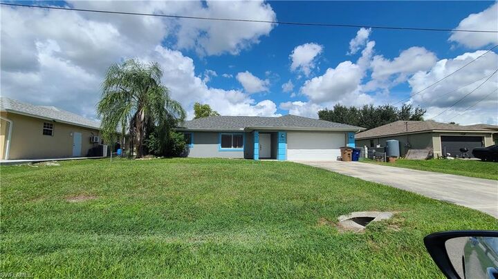 Property Photo:  3106 10th St W  FL 33971 