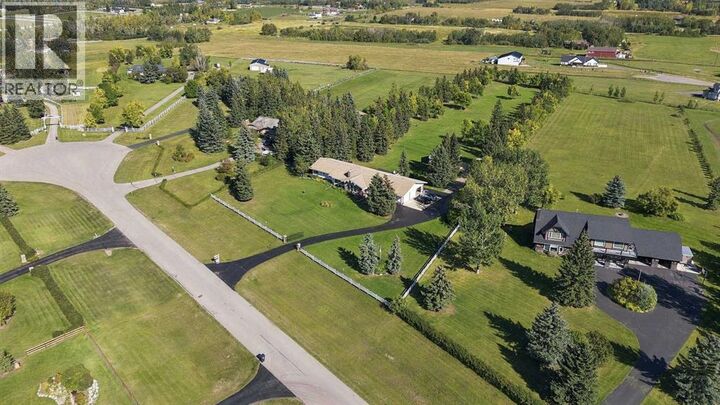 Property Photo:  266056 24 Street West  AB T1S 3M5 