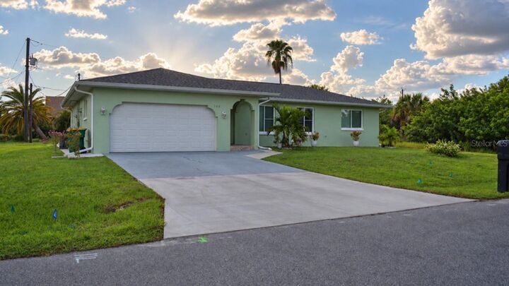 Property Photo: 266 Warwick Street NW FL 33952