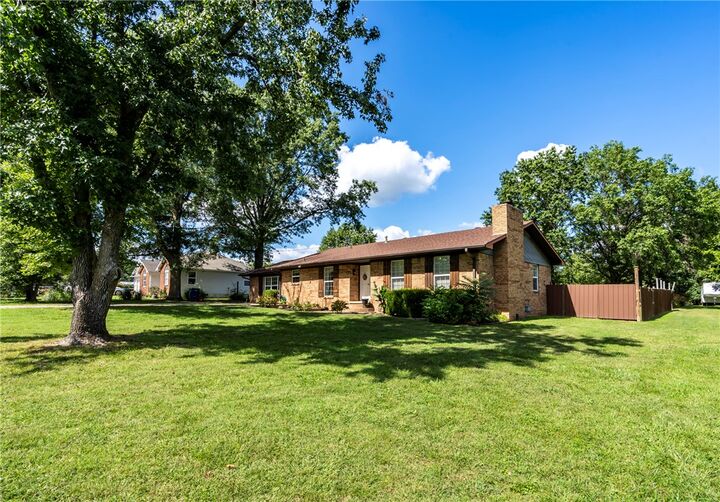 Property Photo:  203 W Raines Road  AR 72761 