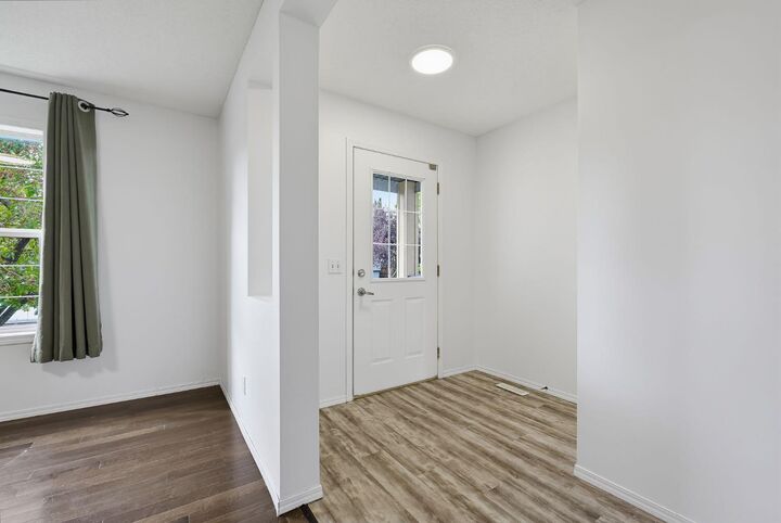 Property Photo:  15 Coventry Link NE  AB T3K 5H6 