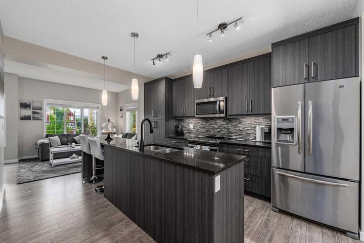 Property Photo:  304 Marquis Lane SE  AB T3M 2G8 