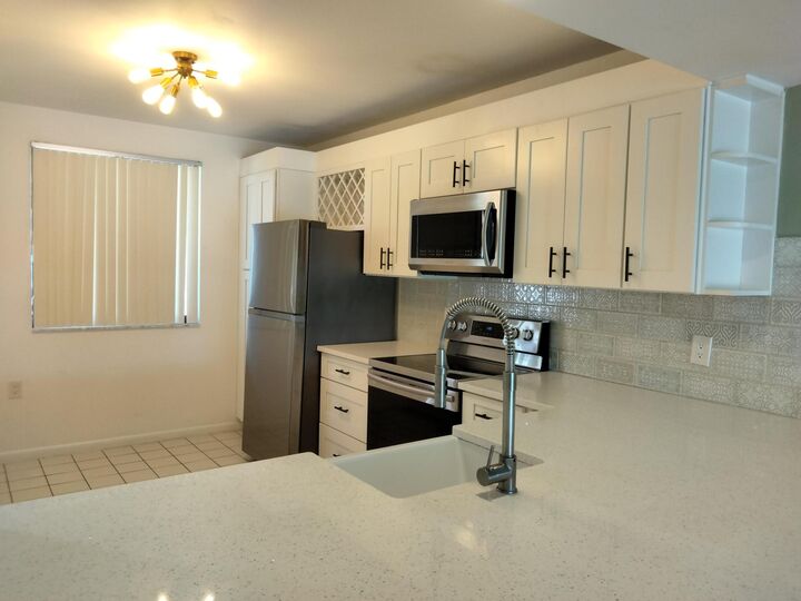 Property Photo:  2401 Village Boulevard 202  FL 33409 