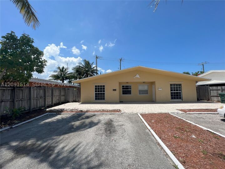 Property Photo: 311-315 NW 57th St FL 33309