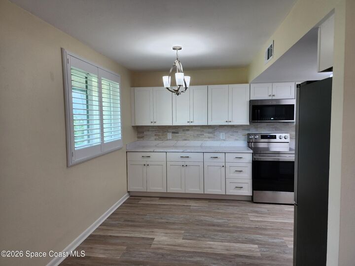 Property Photo:  5801 N Atlantic Avenue  FL 32920 