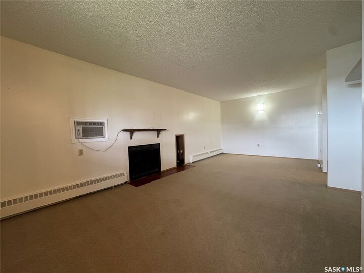 Property Photo:  67 Wood Lily Drive 415  SK S6J 1G6 