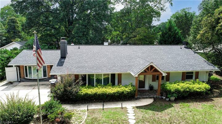 Property Photo:  3917 W Friendly Avenue  NC 27410 