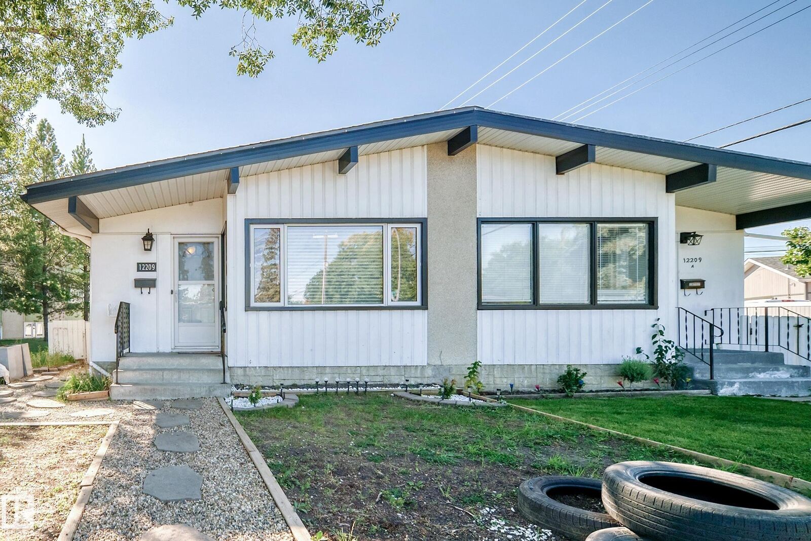 Property Photo:  12209 134B Avenue NW  AB T5L 3W9 
