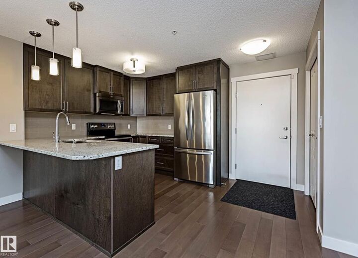 Property Photo:  2207 44 Avenue NW 109  AB T6T 0T2 