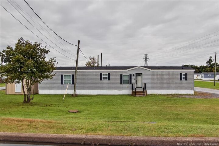 Property Photo:  3 Daisy Street  NB E2M 5M9 