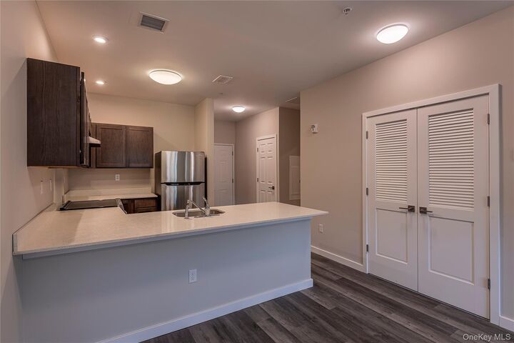 Property Photo: 87 NE Chestnut Street 214 NY 12561