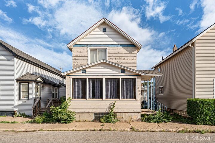 Property Photo:  327 Bank Street  MI 49849 
