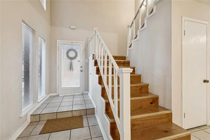 Property Photo: 209 Bon Temps Roule Drive 9B LA 70471