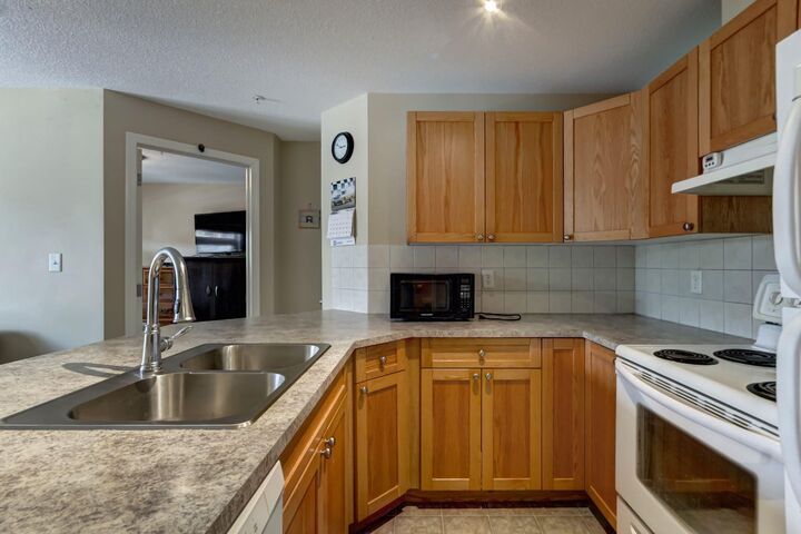 Photo de la propriété: 186 Kananaskis Way 202 AB T1W 0A2