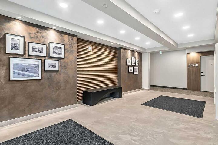 Property Photo: 100 Banister Drive 2305 AB T1S 5Y3
