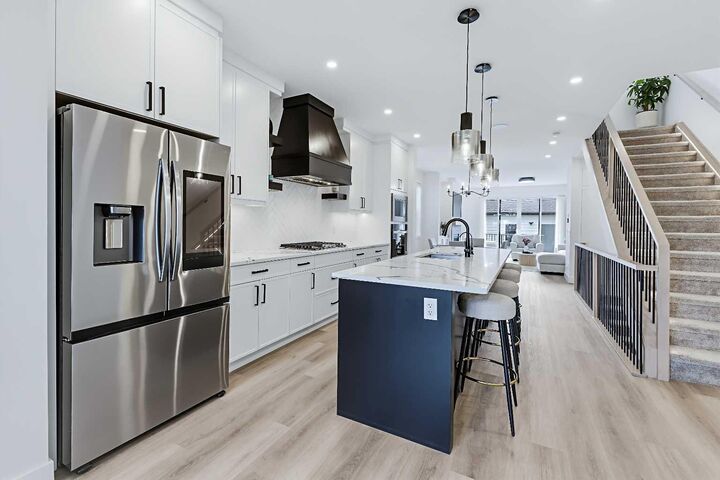 Property Photo:  7341 37 Avenue NW  AB T3B 1W7 