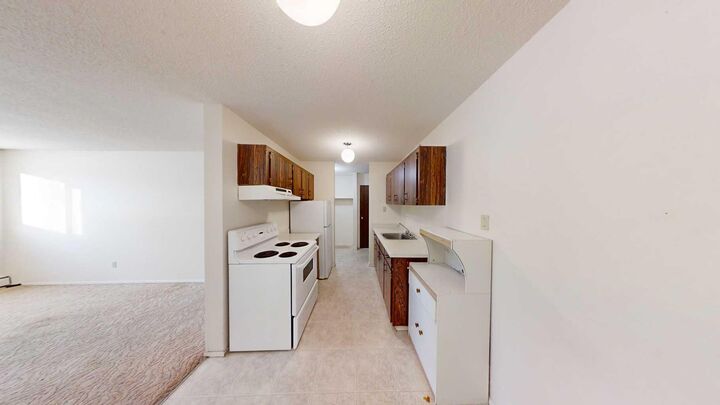Property Photo: 9656 Hillcrest Drive 205 AB T8V 1B1