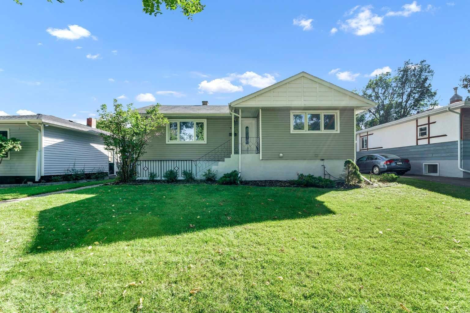 Property Photo:  337 8 Street SW  AB T1A 4L8 