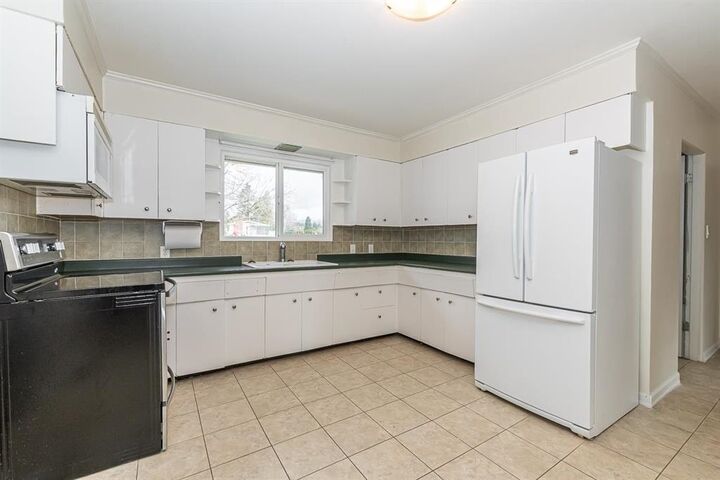 Property Photo:  46615 Fraser Avenue  BC V2P 2L1 